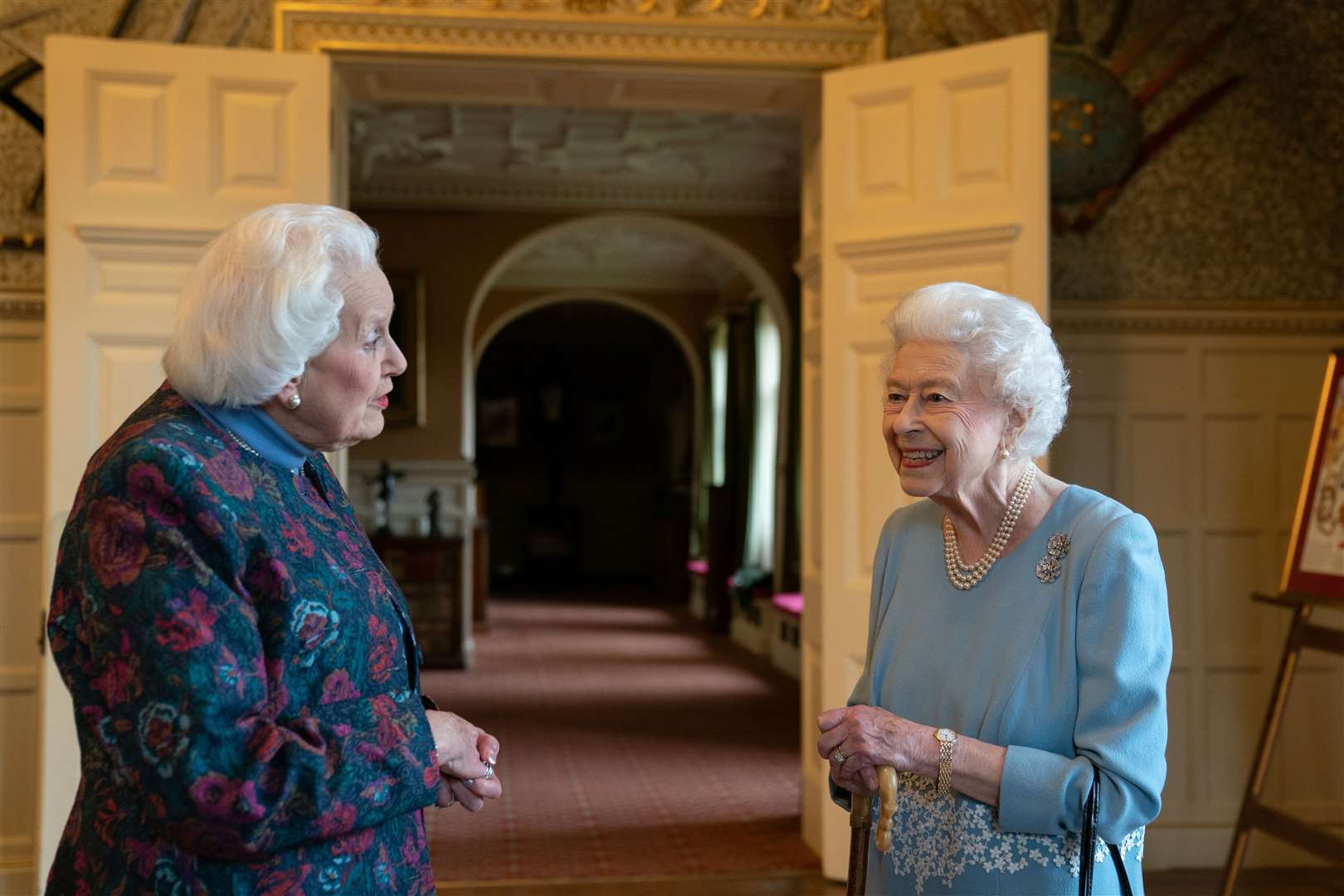 The Queen meets Angela Wood, who helped created coronation chicken (Joe Giddens/PA)