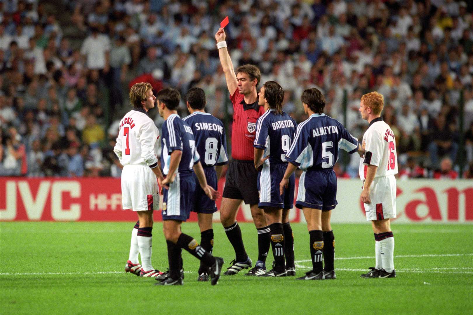 Beckham is shown the red card after a foul on Argentina’s Diego Simeone (Adam Butler/PA)