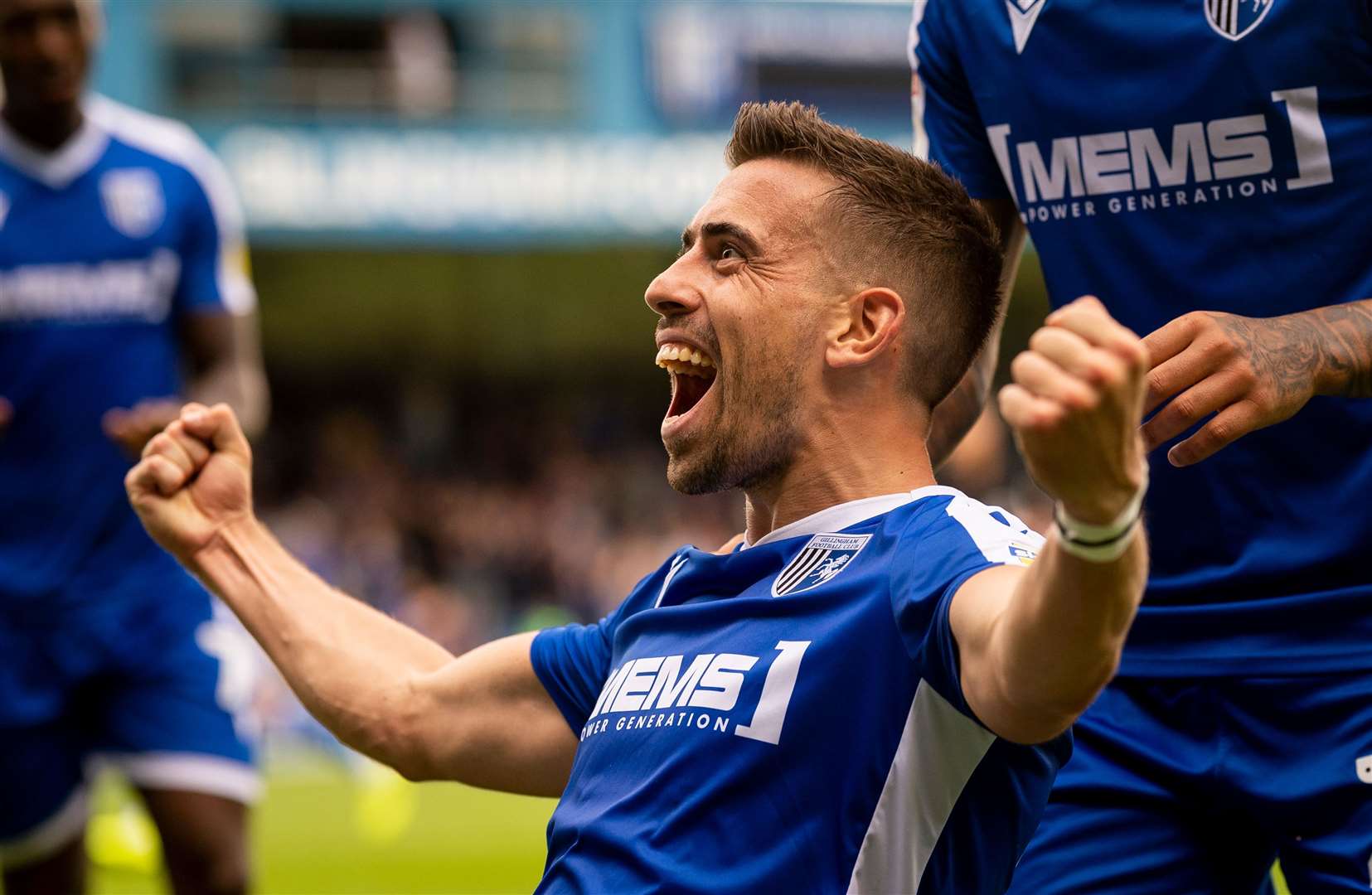 Olly Lee celebrates scoring his second goal against Bolton, in his first game back with the Gills Picture: Ady Kerry