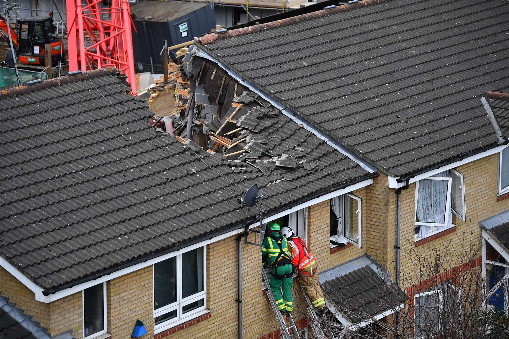 Emergency personnel at the scene in Bow (Victoria Jones/PA)