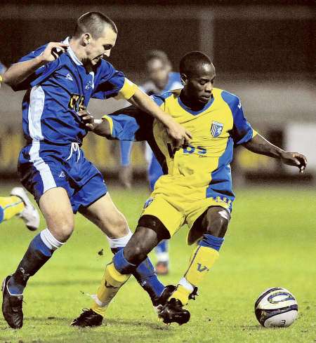 Gabriel Odunaike battles through the Millwall defence