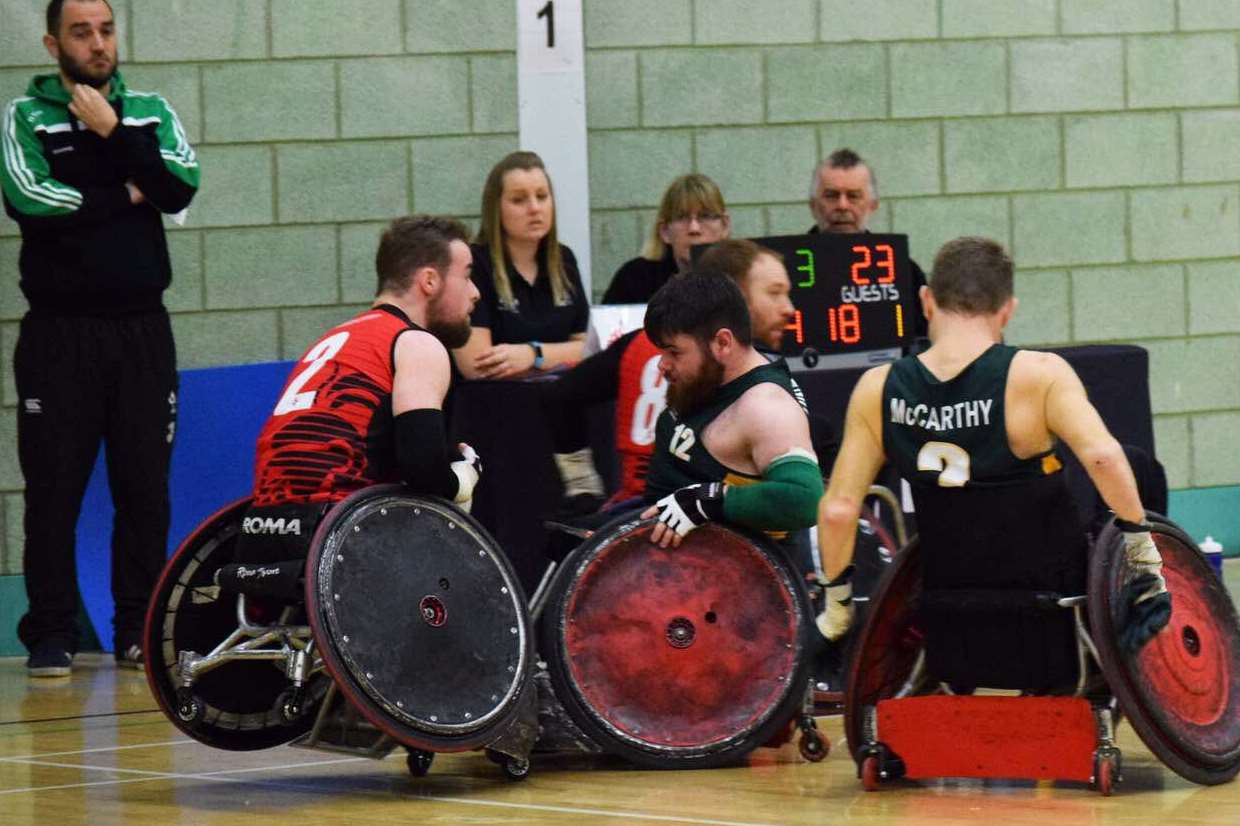Ollie playing wheelchair rugby with his team Canterbury Hellfire.