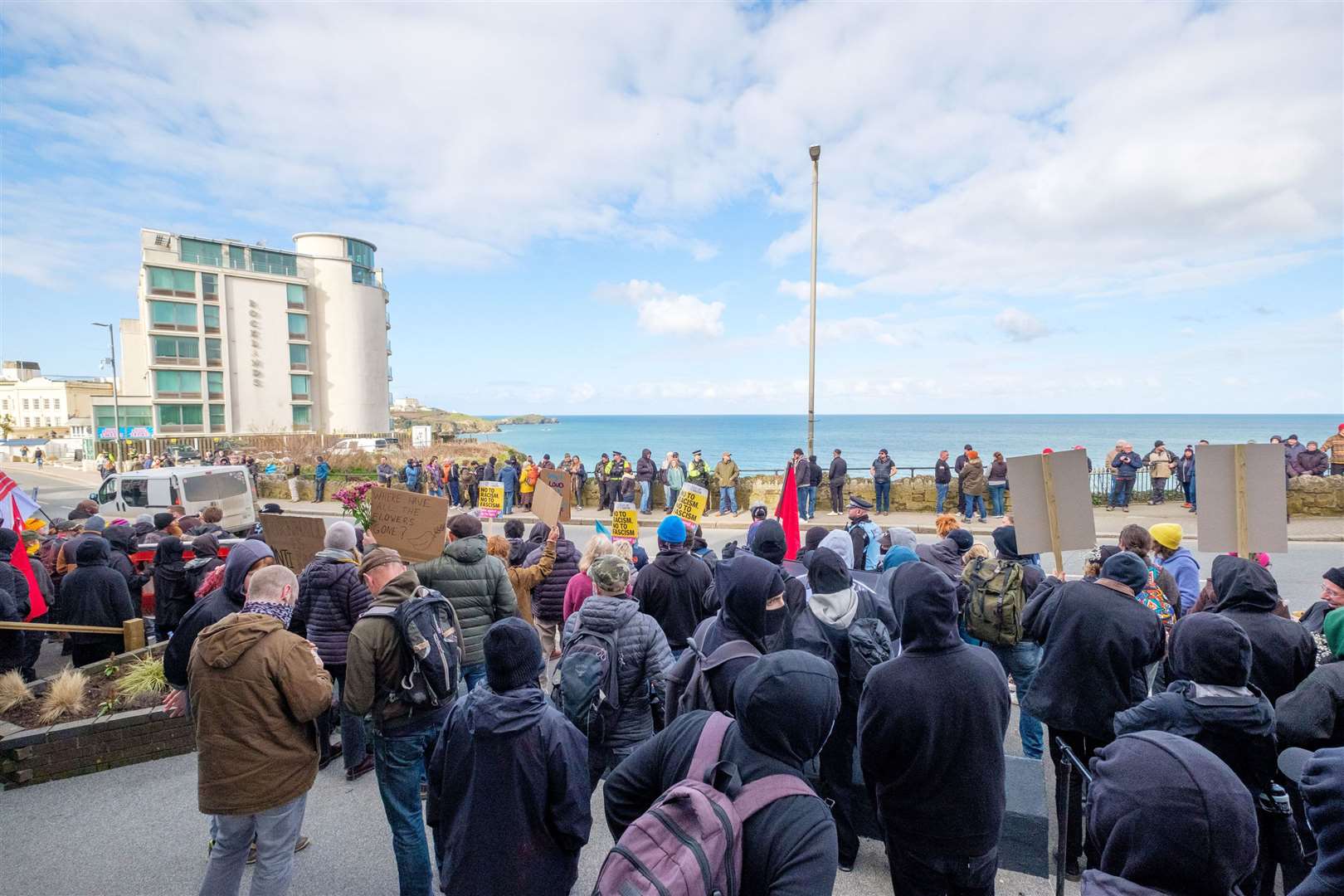 Protesters from nationalist group Patriotic Alternative and anti-fascists from Cornwall Resists, face each other during a protest in Newquay, Cornwall (PA)