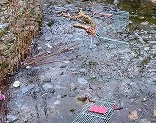 Dartford Borough Council posted images of individuals after two males were seen throwing large rocks and wood into the pond at Acacia Hall. Picture: Dartford Borough Council