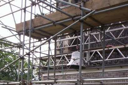 One of the bells being lowered down from the tower