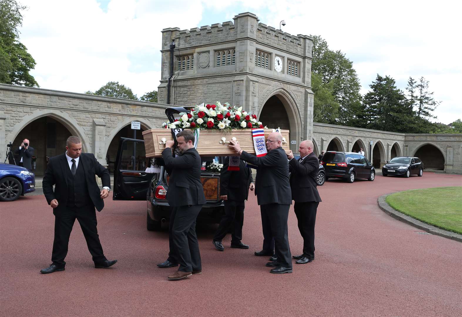 The coffin of Jack Charlton is taken into West Road Crematorium in Newcastle for his funeral (Peter Byrne/PA)