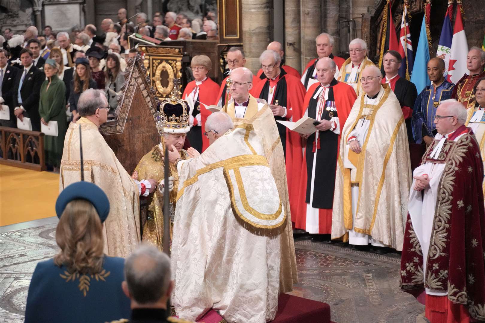 The King receives The St Edward’s Crown during his coronation ceremony in Westminster Abbey (Jonathan Brady/PA)