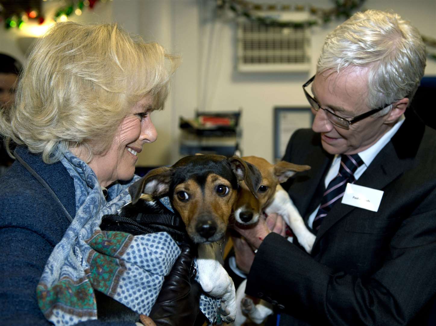 Camilla with Paul O’Grady and her two adopted dogs Bluebell and Beth (Adrian Dennis/PA)