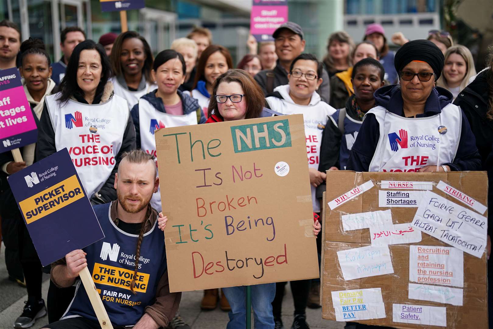 Members of the Royal College of Nursing union on the picket line outside Queen Elizabeth hospital in Birmingham (Jacob King/PA)