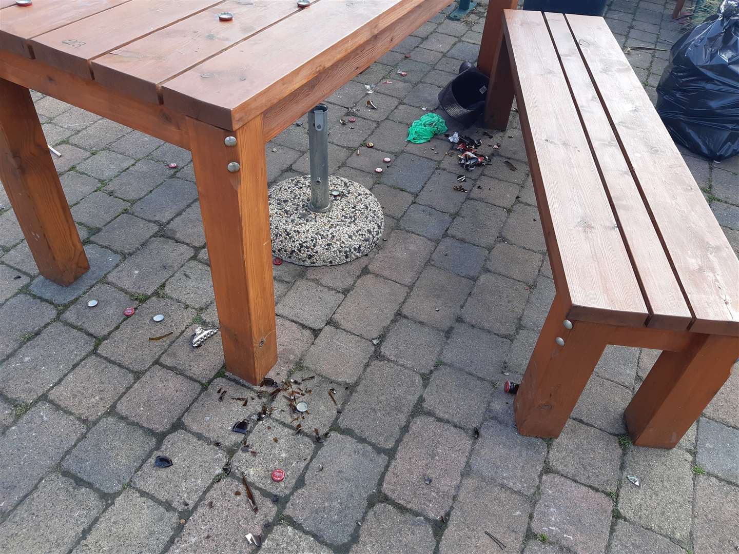 Smashed glass litters the floor outside the Port Arms pub in Deal