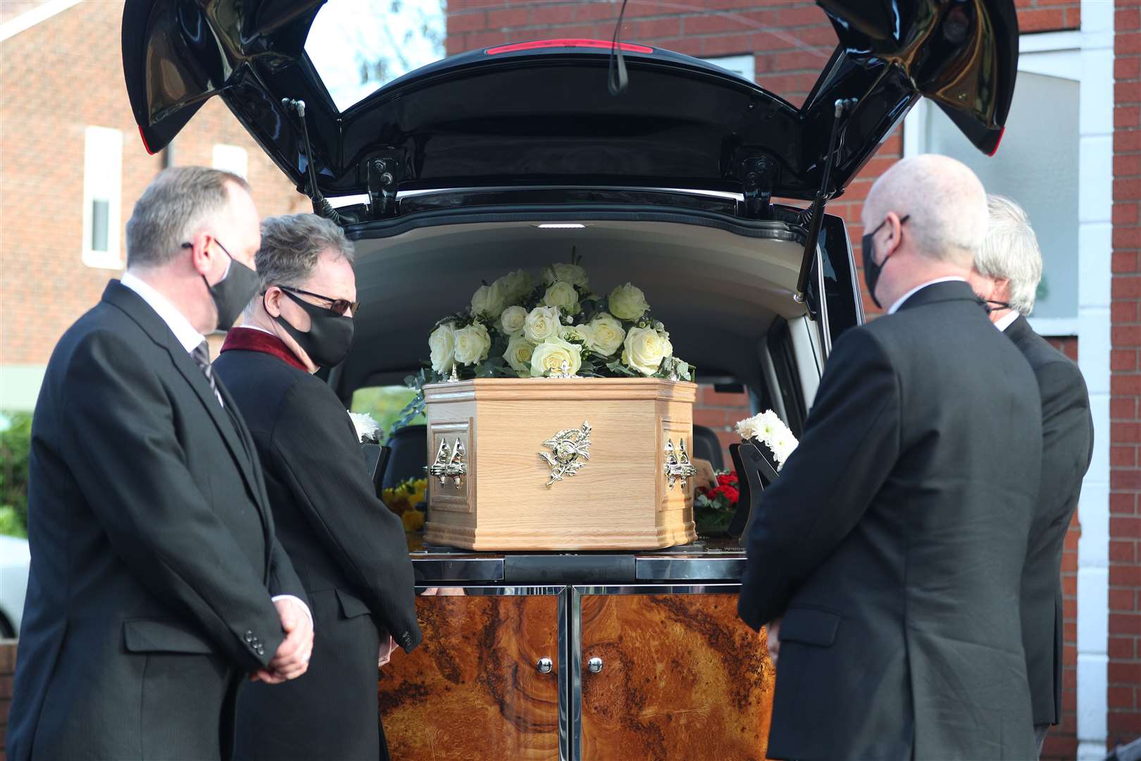 The funeral cortege arrives at the church (Peter Byrne/PA)