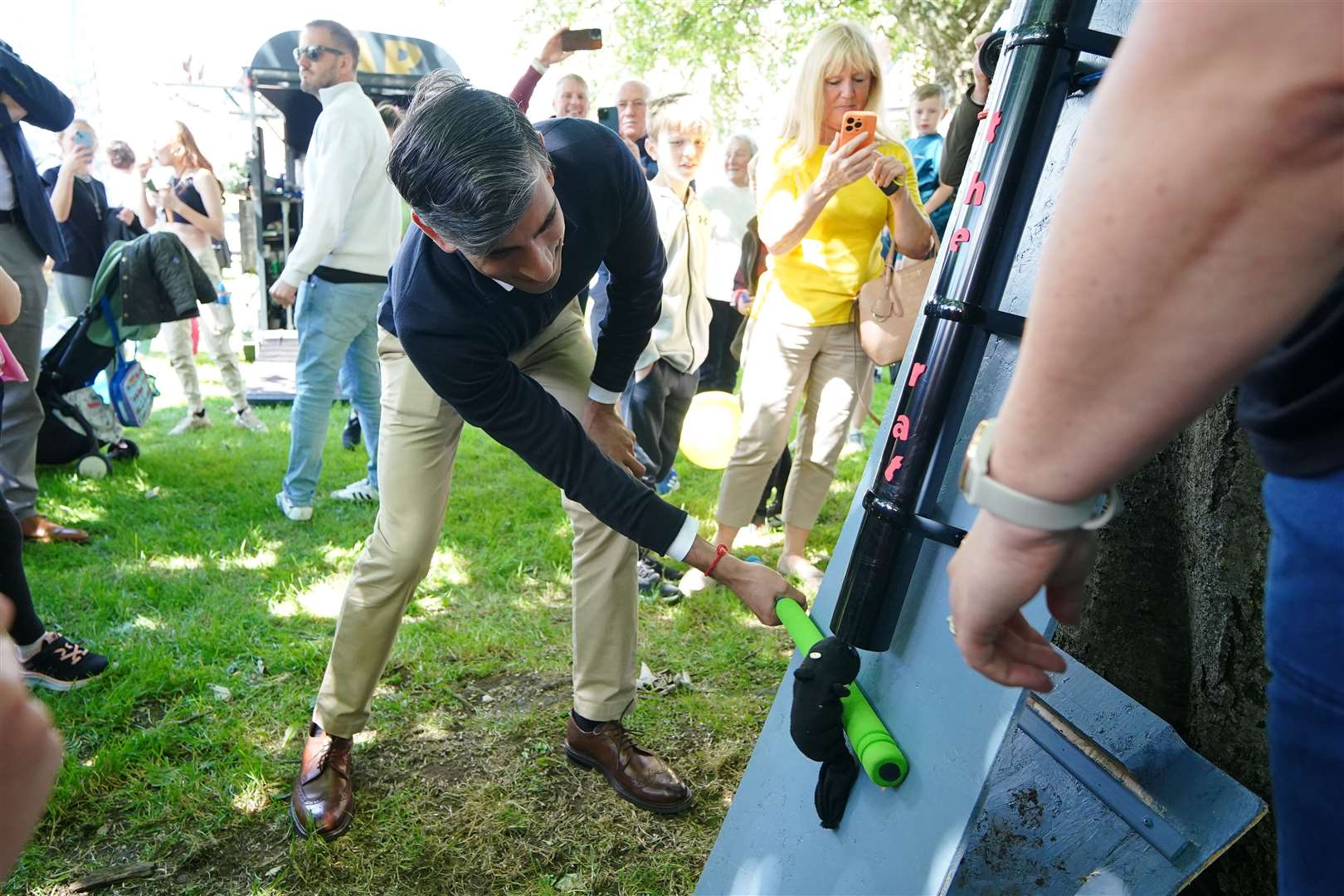 Prime Minister Rishi Sunak played ‘Splat the Rat’ at a village fete in Great Ayton, Yorkshire (Peter Byrne/PA)