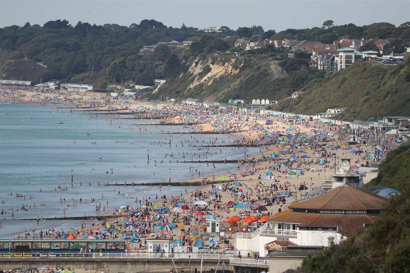 People enjoy the hot weather on Bournemouth beach in Dorset (Andrew Matthews/PA)