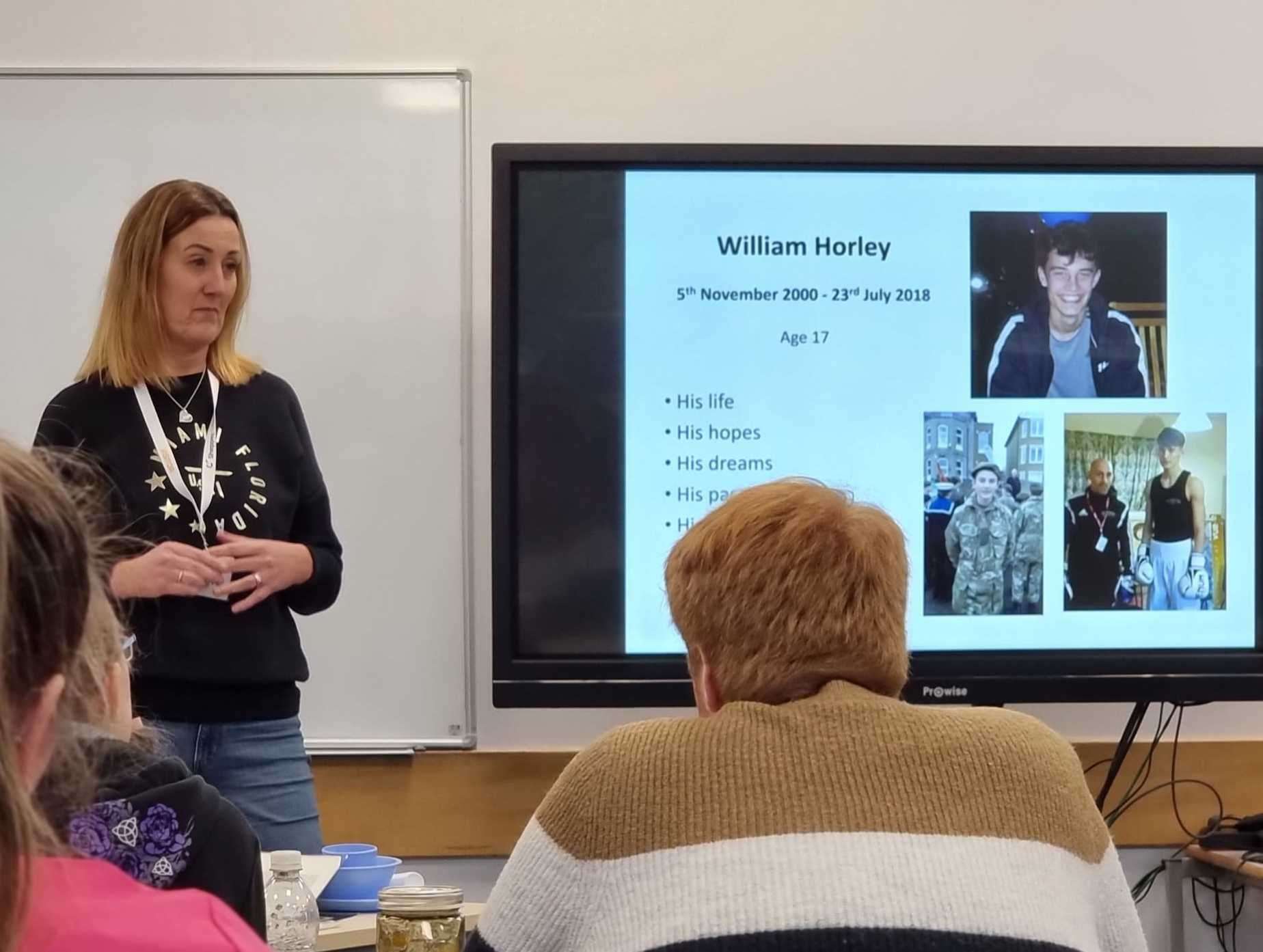 Kim Webster speaking to school pupils at a seminar, warning of the dangers of taking drugs