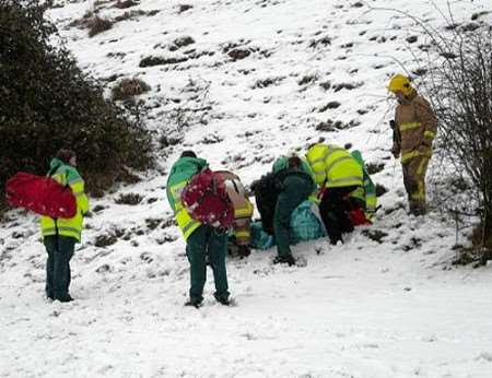 Emergency services attend to the injured boy