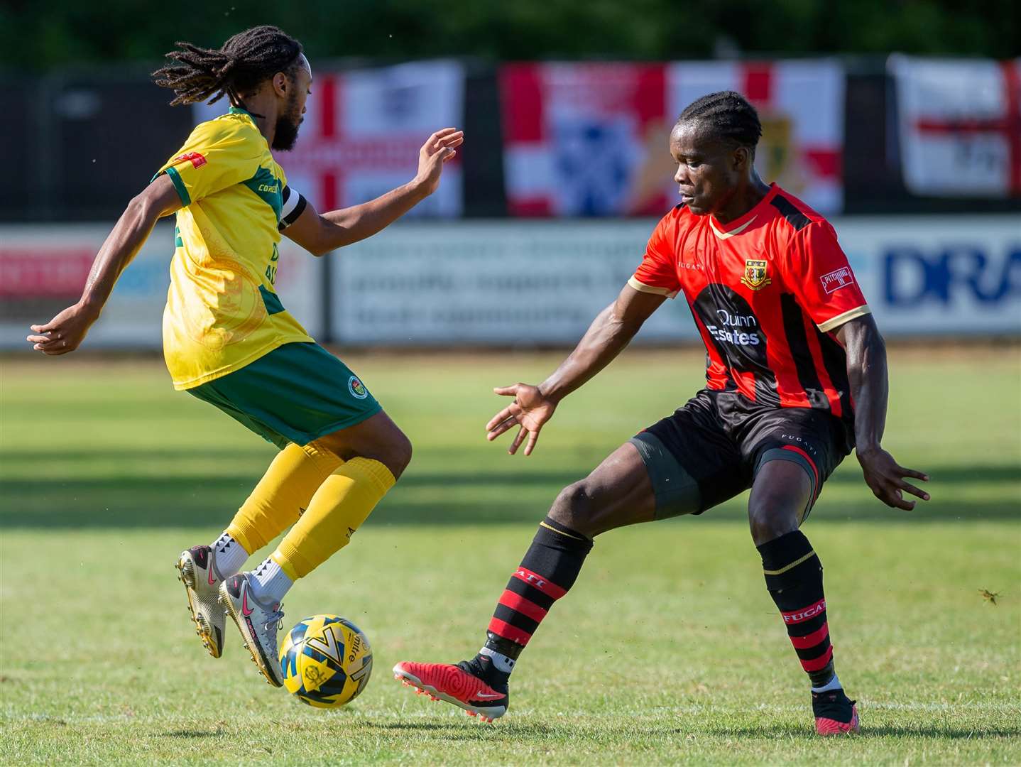 Darnell Kithambo stands up to Ashford defender Bradley Simms in the Kent Senior Cup last weekend. Picture: Ian Scammell/Isobel Scammell