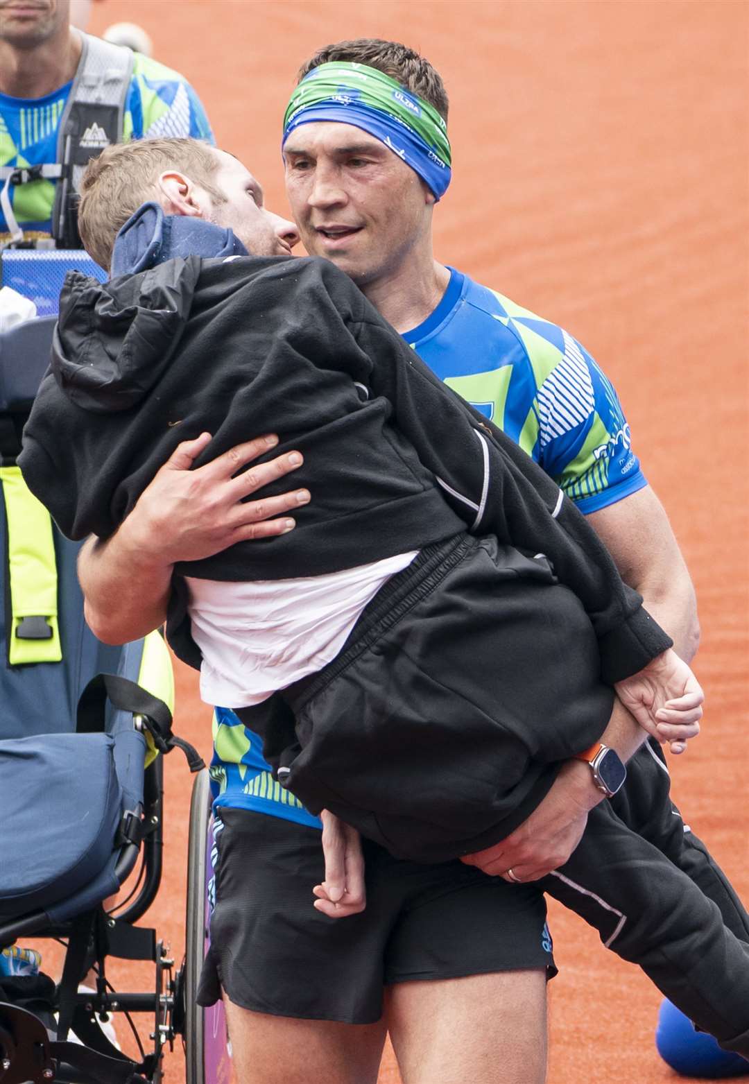 Rob Burrow and Kevin Sinfield cross the finish line of the 2023 Rob Burrow Leeds Marathon (Danny Lawson/PA)