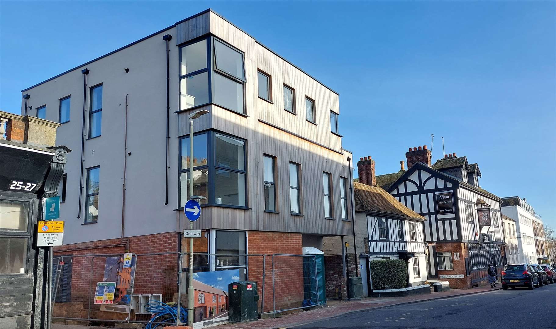 Nine flats and four terraced homes are under construction nearby