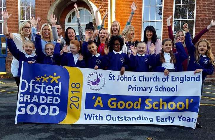 Pupils and staff celebrating the school's penultimate 'Good' Ofsted rating in 2018