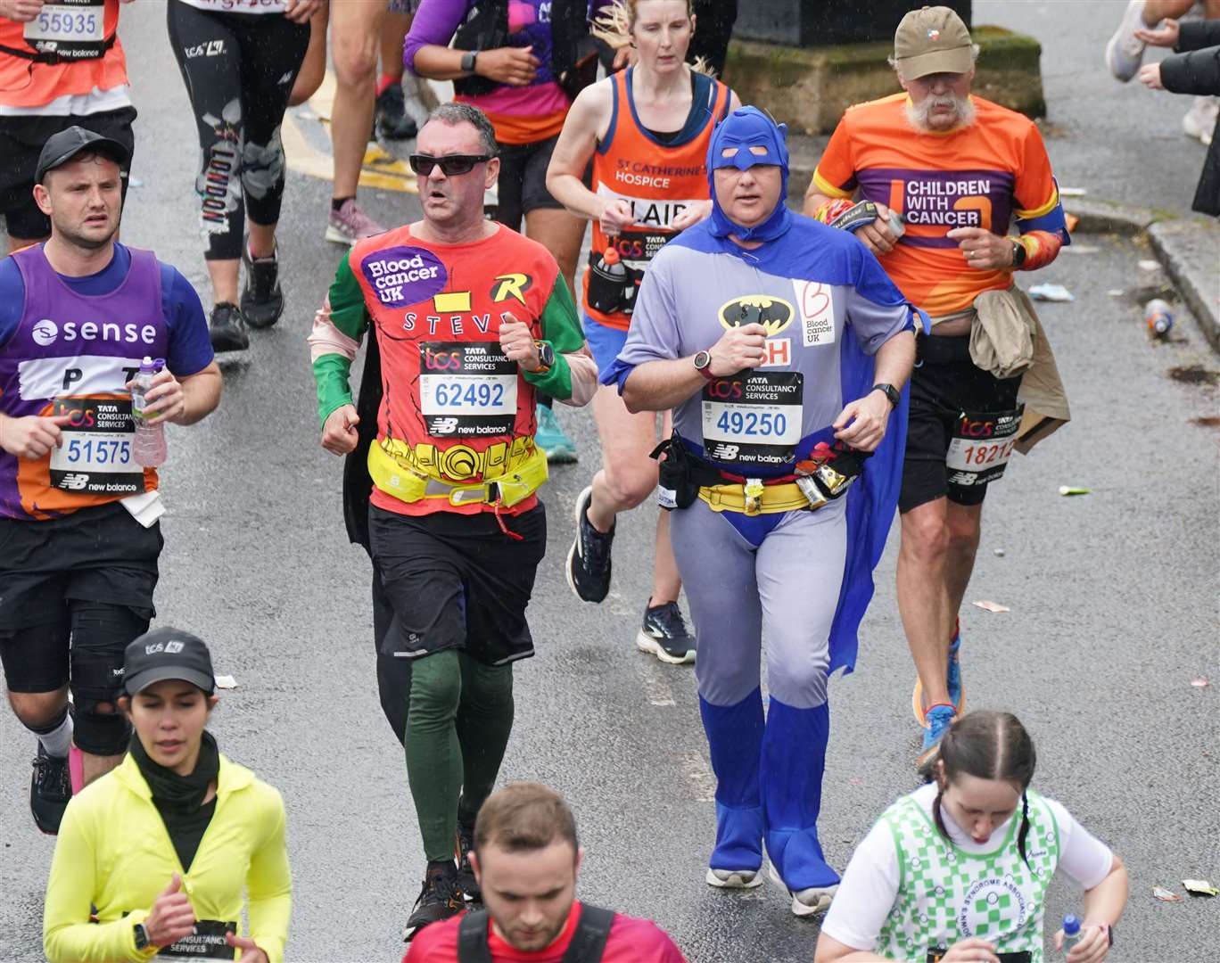 Charity runners during the TCS London Marathon 2023 (Yui Mok/PA)