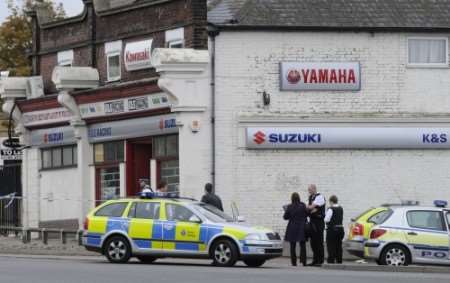 Police outside K&S Racing after the incident