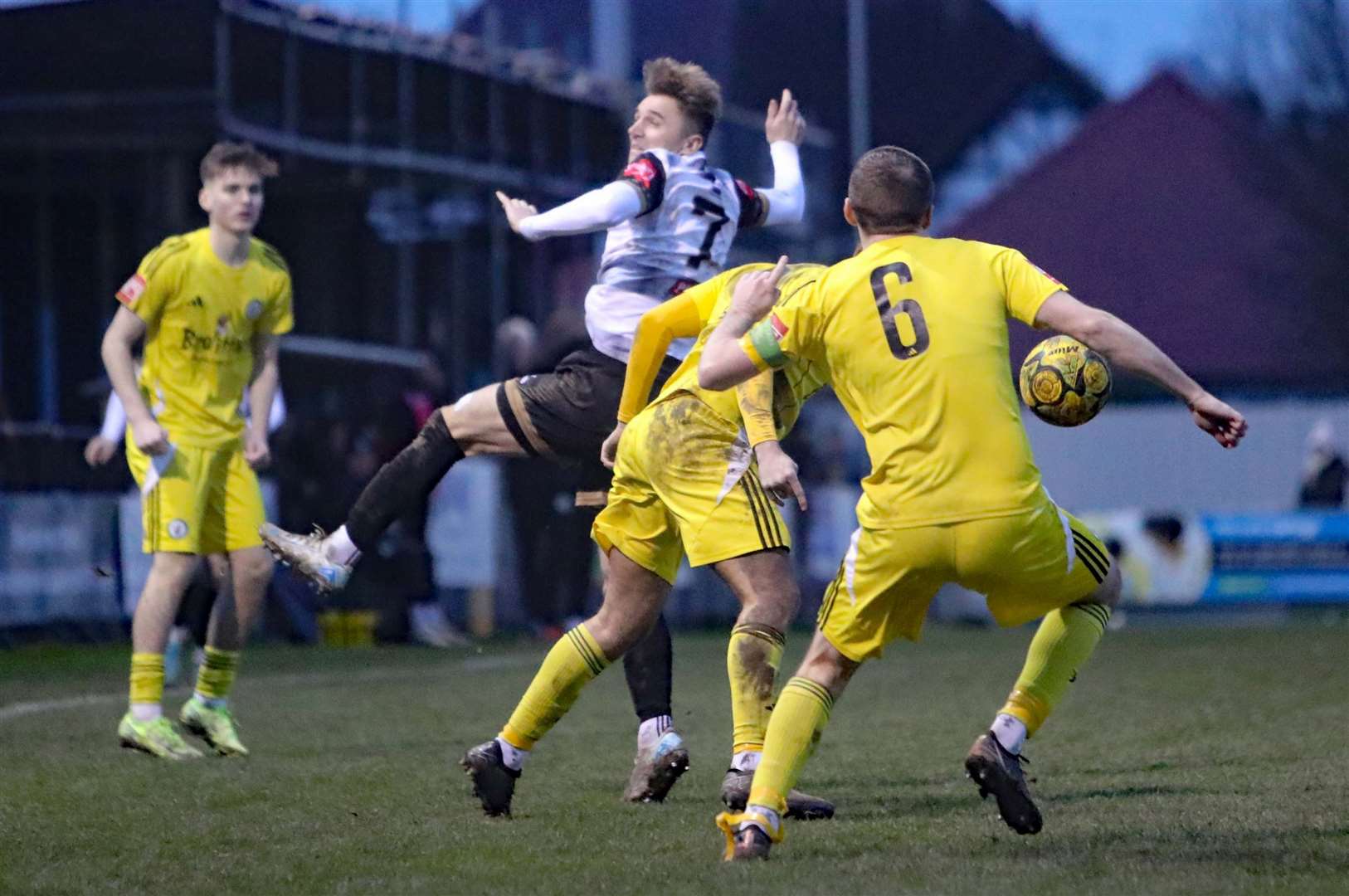 Tom Chapman is crowded out for Deal by Burgess Hill. Picture: Paul Willmott