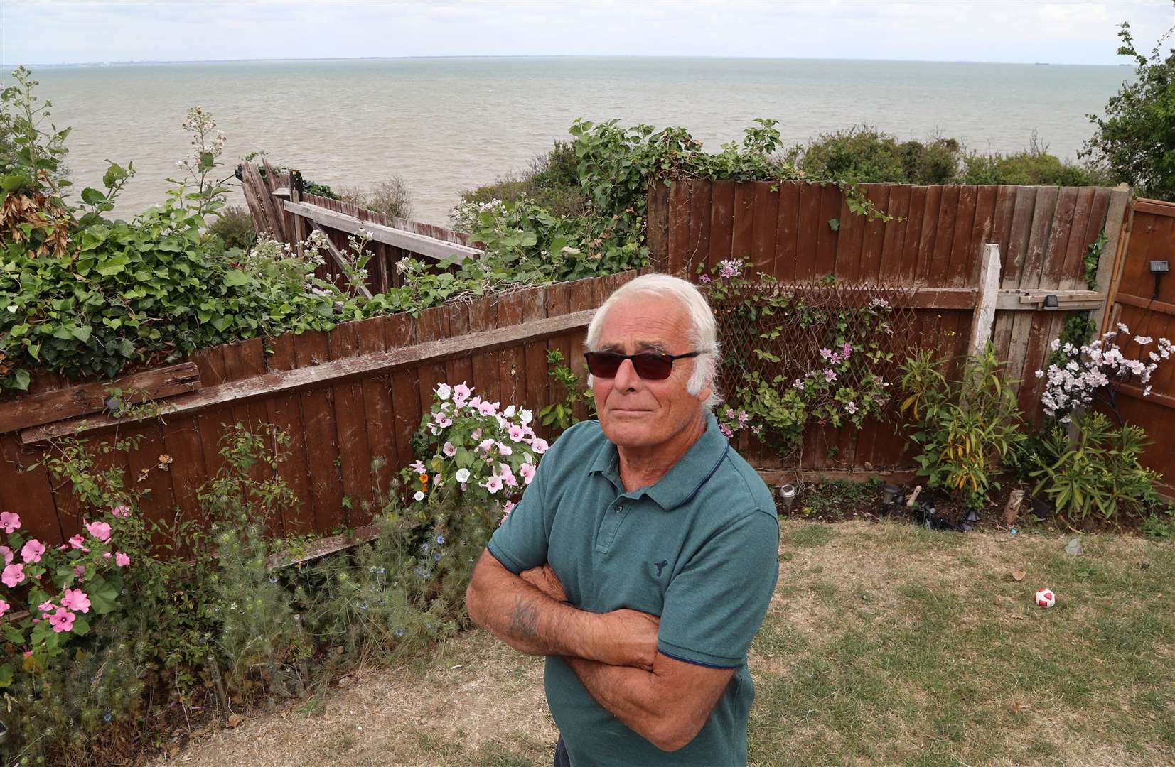 Ed Cane in his garden in Eastchurch, Kent (Gareth Fuller/PA)