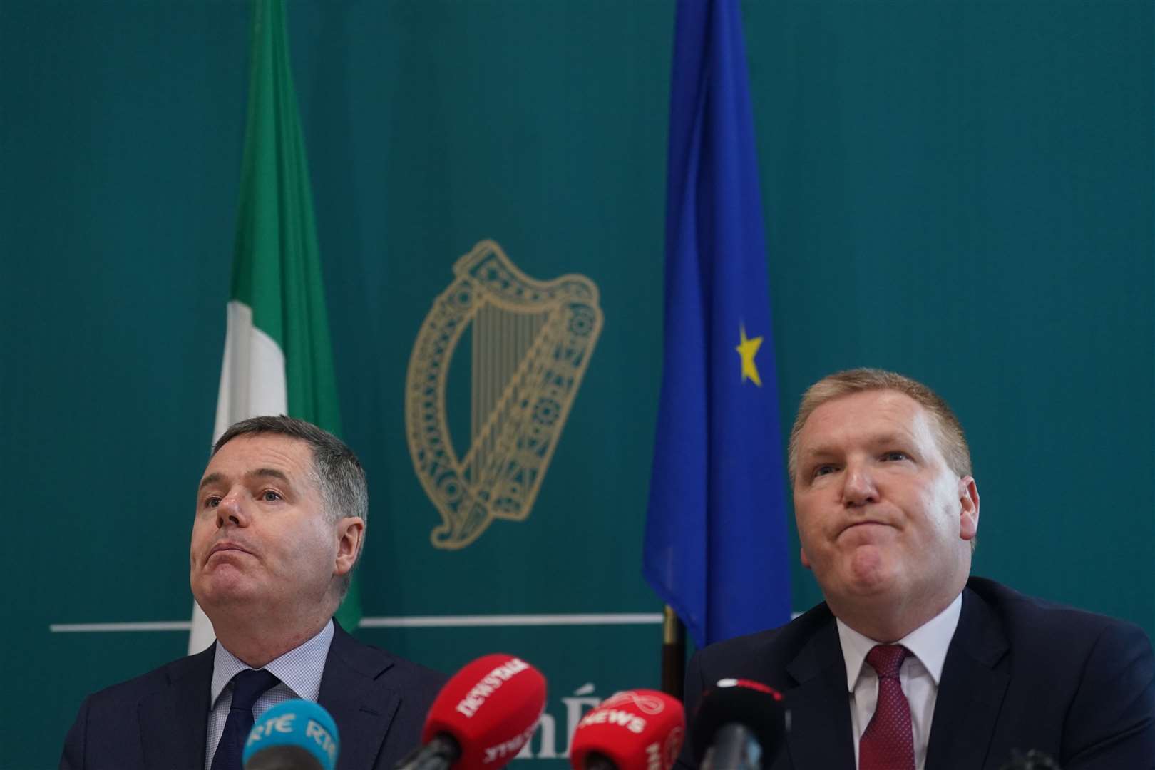 Minister for Public Expenditure Paschal Donohoe (left) and Minister for Finance Michael McGrath answered questions (PA)