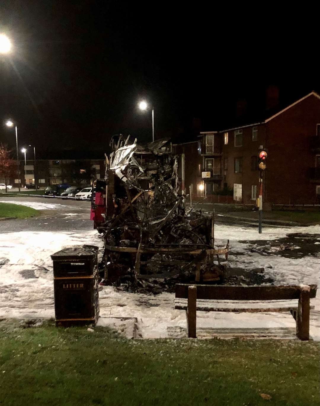 The burnt-out double decker bus in Church Road near Rathcoole (David Young/PA)