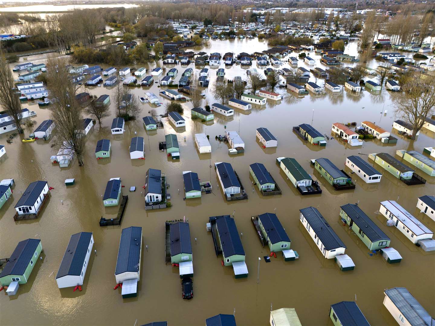 Flooded caravans at Billing Aquadrome Holiday Park near Northampton, Northamptonshire, during Storm Bert (Jordan Pettitt/PA)