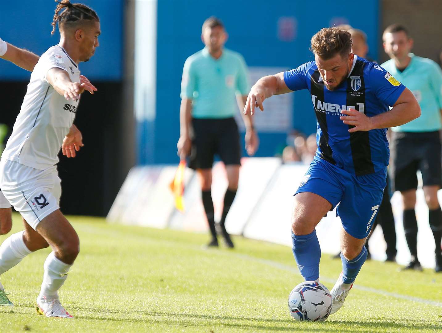 Gillingham midfielder Alex MacDonald gets stuck in against MK Dons. Picture: Andy Jones (51368856)