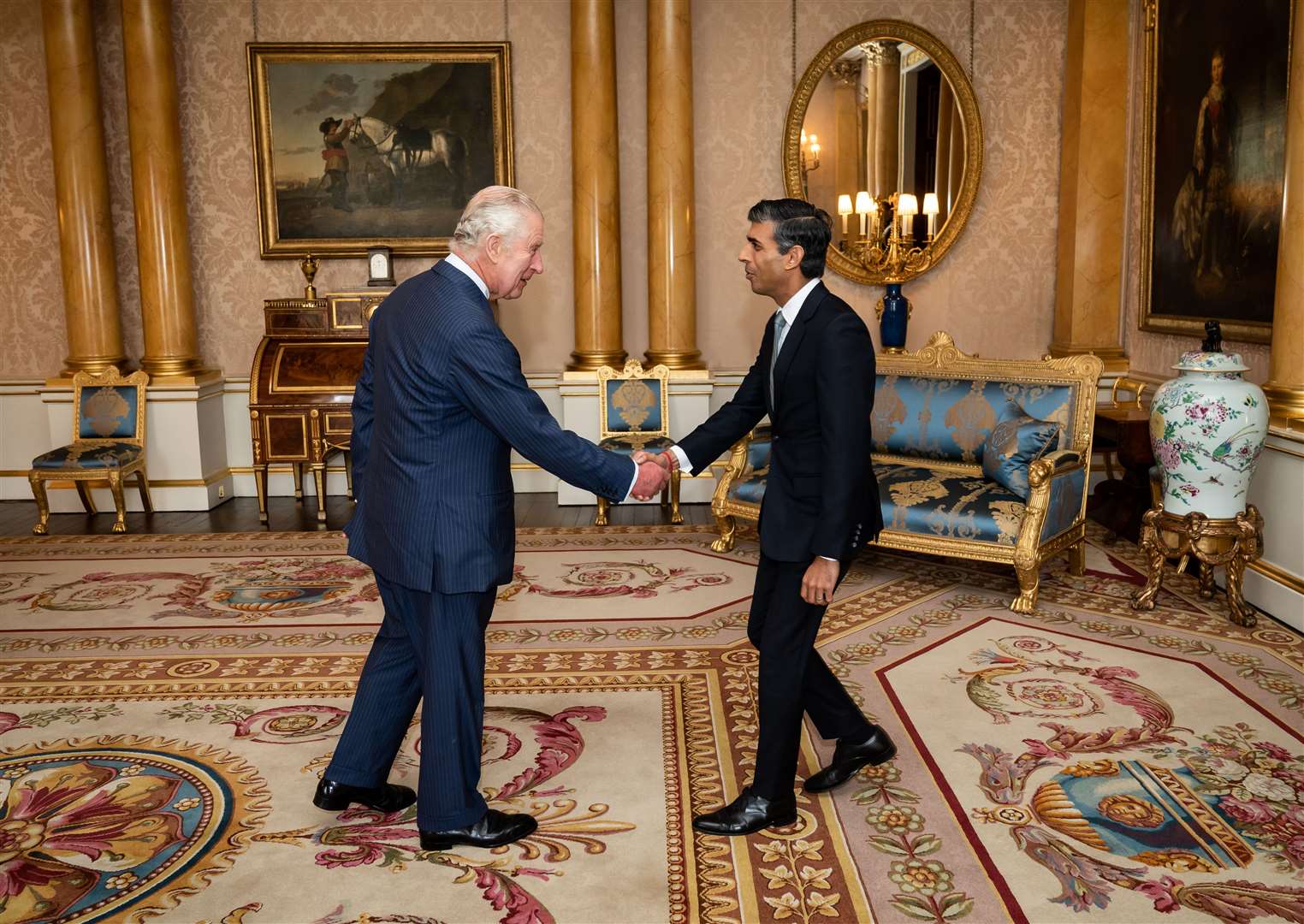 The King shakes hands with Rishi Sunak in 2022 as he invites him to become Prime Minister as the Conservatives’ new leader (Aaron Chown/PA)