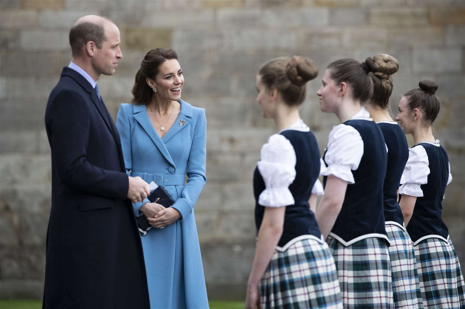 The Duke and Duchess of Cambridge meet Highland dancers during a Beating of the Retreat at the Palace of Holyroodhouse in Edinburgh (Jane Barlow/PA)