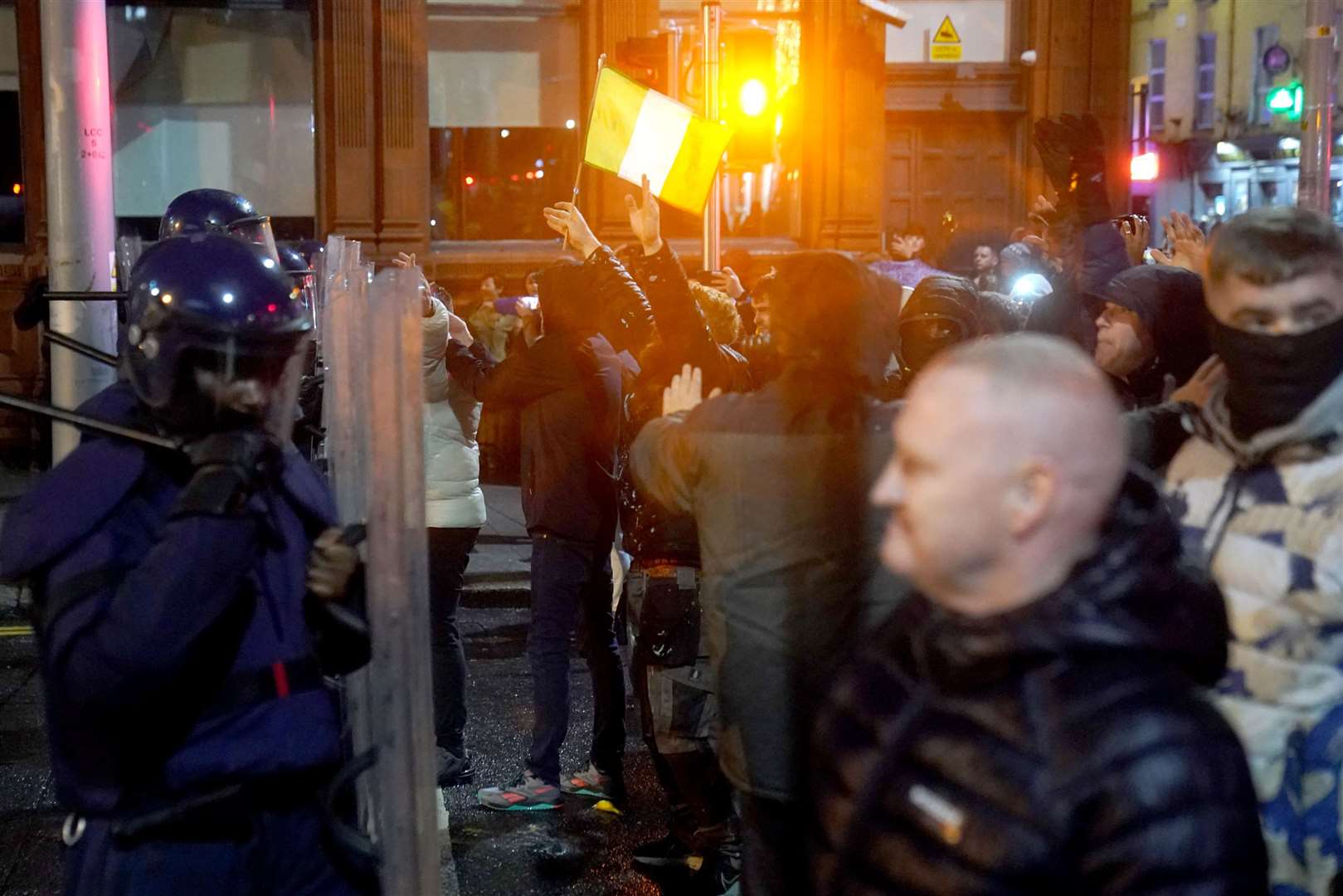 An Garda Siochana face off against protesters at the scene in Dublin city centre (Brian Lawless/PA)