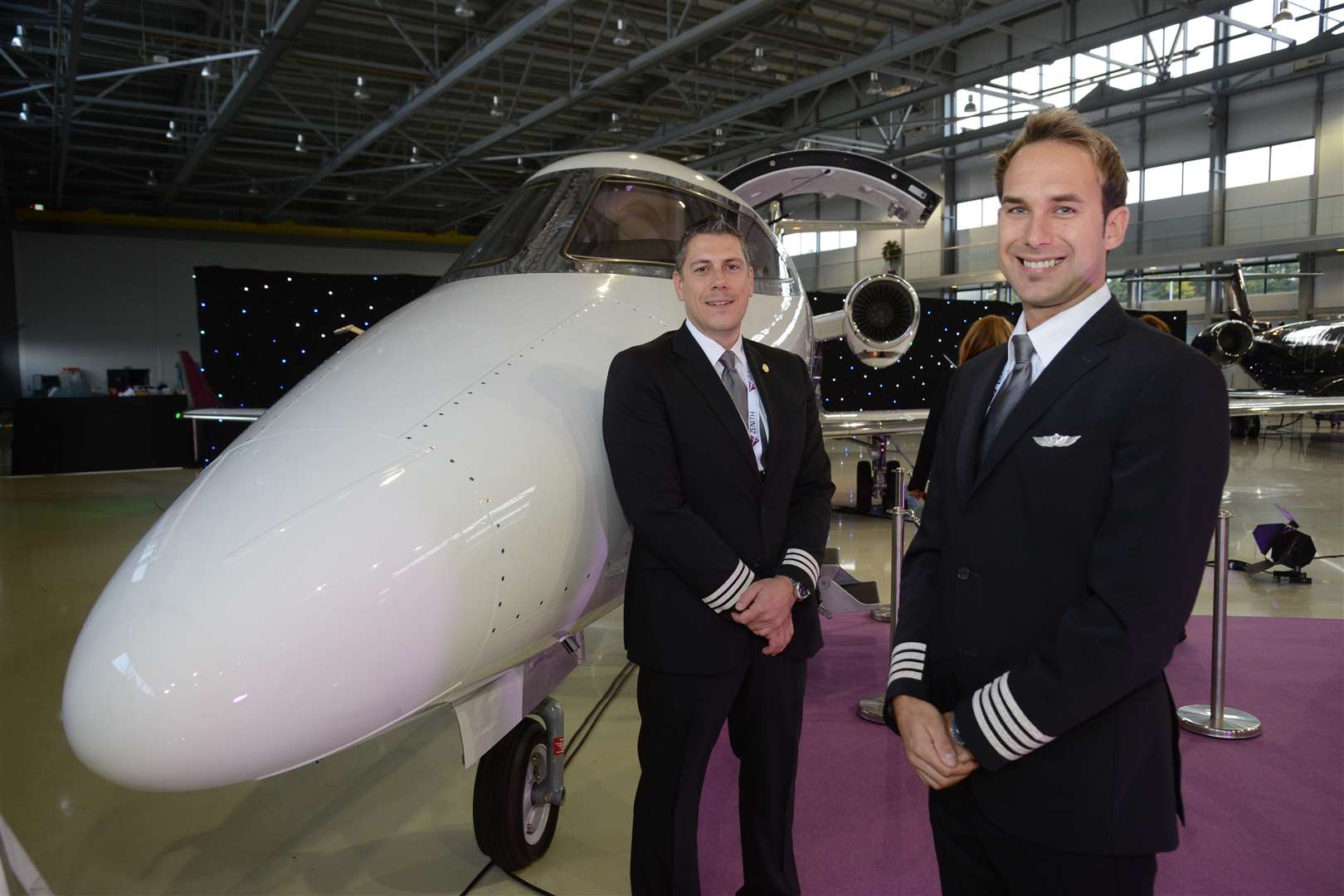 Senior First Officer Mike Imlach and Captain Ben Campbell with the new Learjet 75