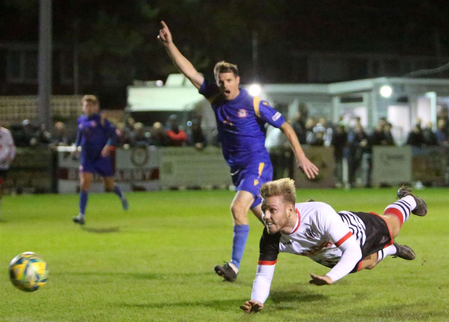 Deal striker Aaron Millbank heads wide against Hollands & Blair. Picture: Paul Willmott