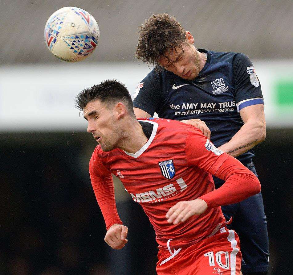 Conor Wilkinson is beaten in the air Picture: Ady Kerry