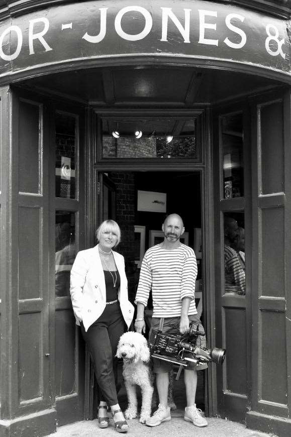 Sonja and Richard Taylor Jones with Delilah outside their shop. Pictured for Another Real Deal (2019) by Liz Mott