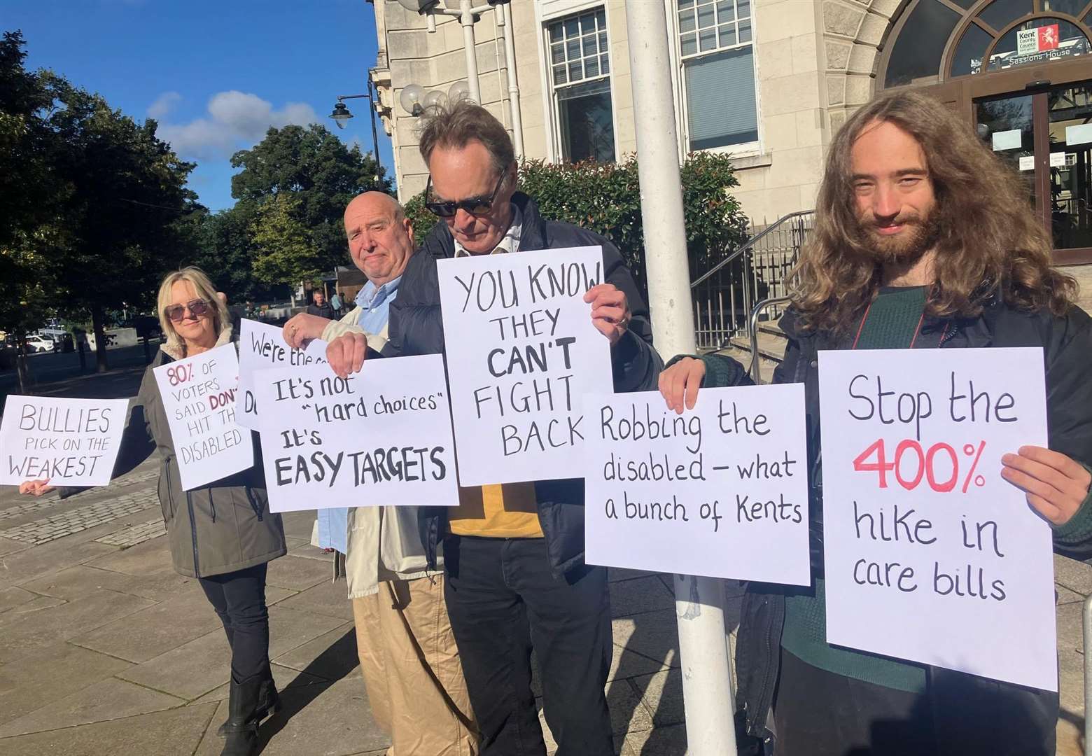 Protesting: (L-R) Bernadette John, Ian Driver, Jonathan John and Seb John outside County Hall this morning (Sept 12 24) Pic Simon Finlay - Local Democracy Reporting Service