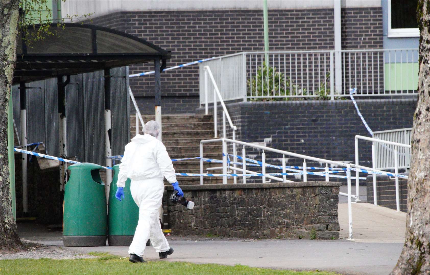 A forensic investigator at Amman Valley school, in Carmarthenshire, after the incident (Ben Birchall/PA)