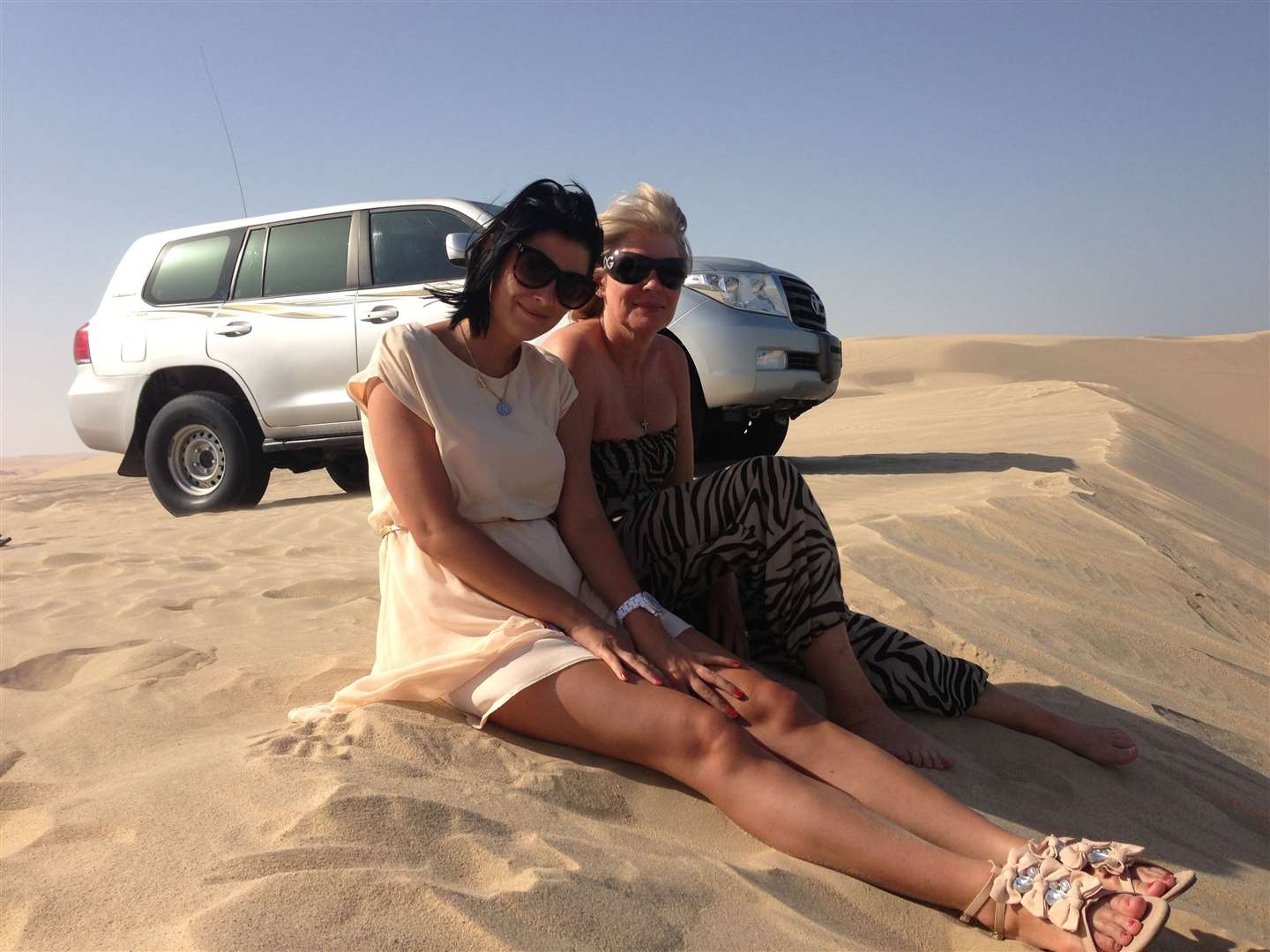 Lauren, left, with her mother Alison Patterson, right, in Qatar