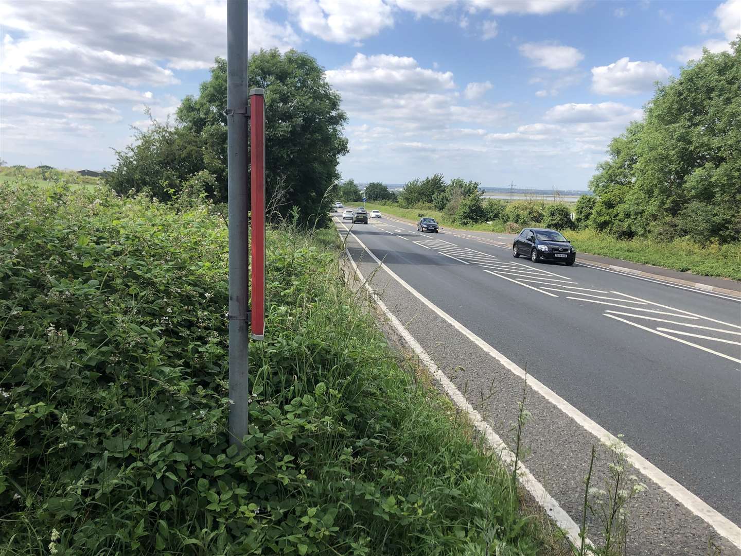 One of the bus stops used to let people off onto a grass verge