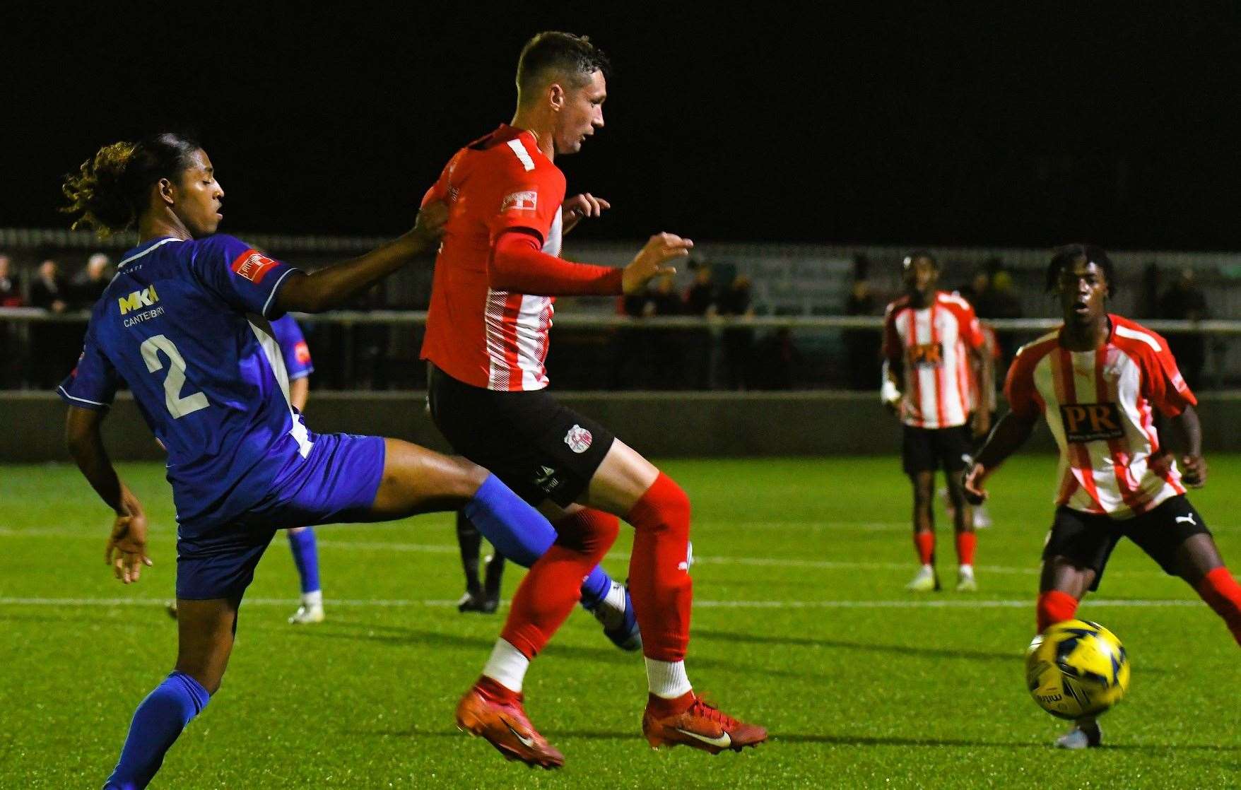 Young Herne Bay defender Skye Salmon, left, put through his own net for the only goal of the game. Picture: Marc Richards