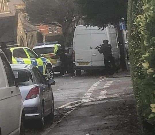Armed police are seen in St John's Church Road in Folkestone. Picture: Georgia-Lee Leizert