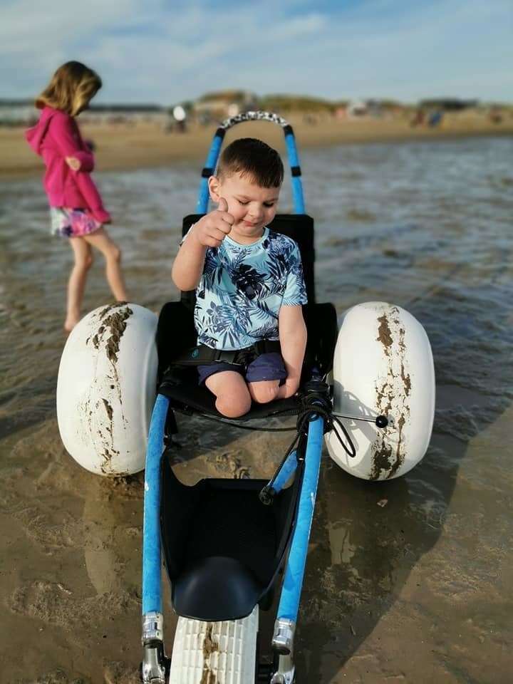 Tony Hudgell on his all-terrain wheelchair at Camber Sands (12339664)