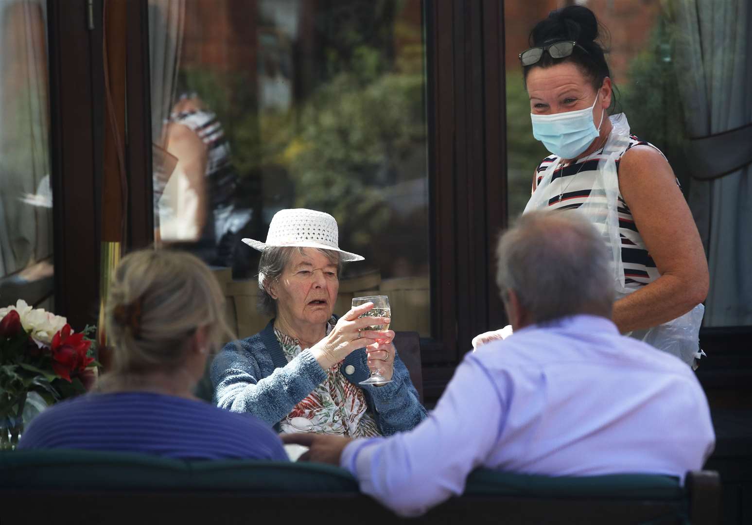 Margaret Yeoman, 90, saw her son John Yeoman, 62, and his wife Denise Yeoman, 63, for the first time in eight weeks (Owen Humphreys/PA)