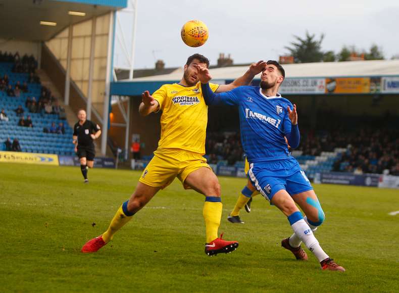 Conor Wilkinson challenges for the ball Picture: Andy Jones