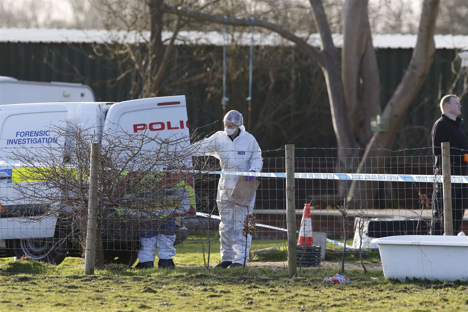 Police at the scene of the alleged raid Picture: Andy Jones