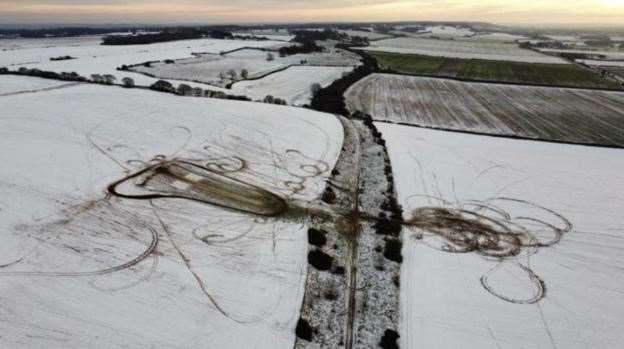 An aerial view of the tracks left by the cross