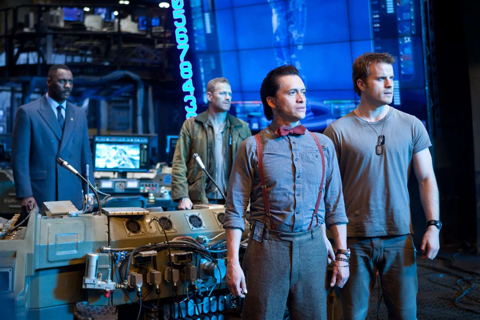 Pacific Rim with Charlie Day as Dr Newton Geiszler, Max Martini as Herc Hansen, Idris Elba as Stacker Pentecost and Robert Kazinsky as Chuck Hansen. Picture: PA Photo/Warner Brothers.